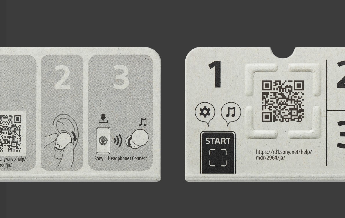 Two types of setup guides side by side. The previous setup guide on the left is printed in gray color on light gray material. The new setup guide on the right is printed in black on light gray material.