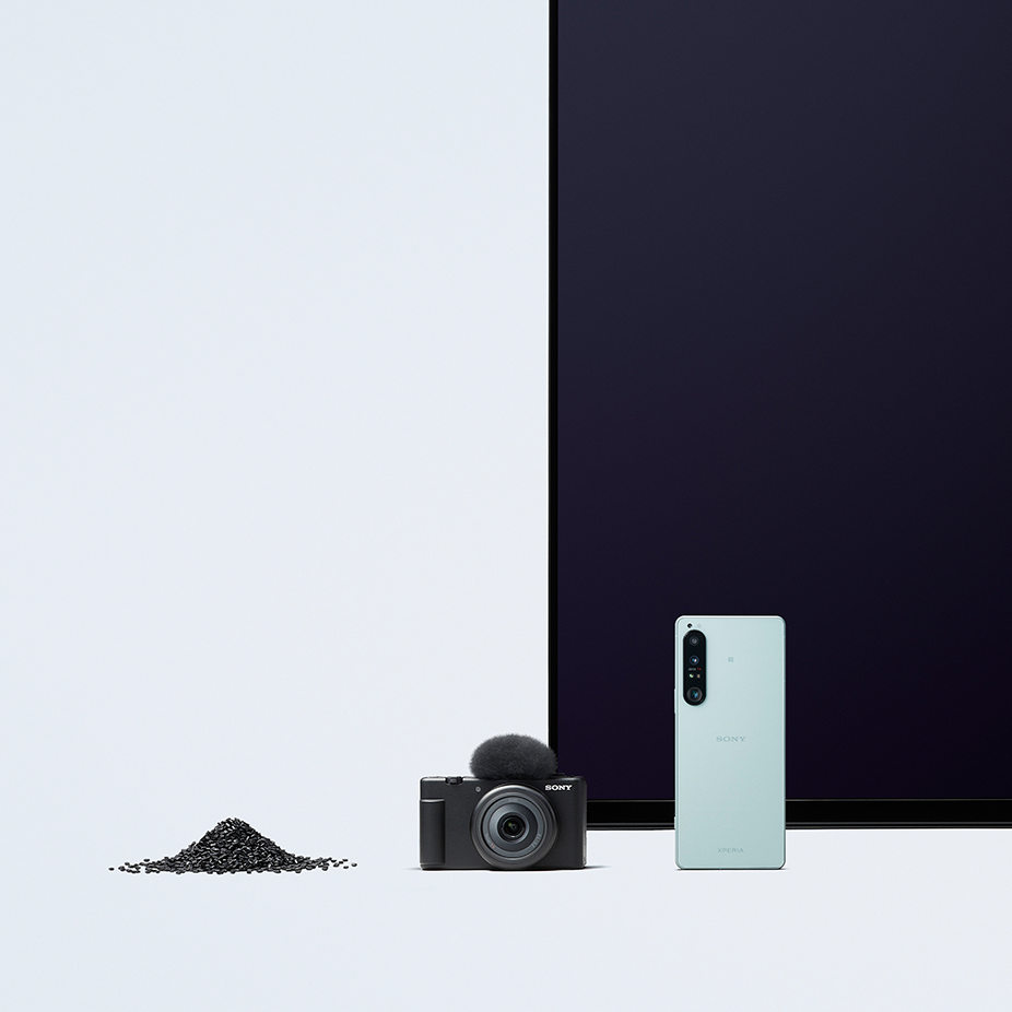 Sorplas pellets lined up alongside a compact camera, a smartphone and a television