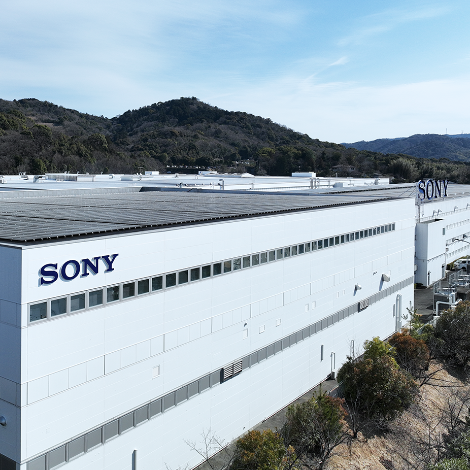 Photograph showing factory roof with solar panel and “SONY” logo