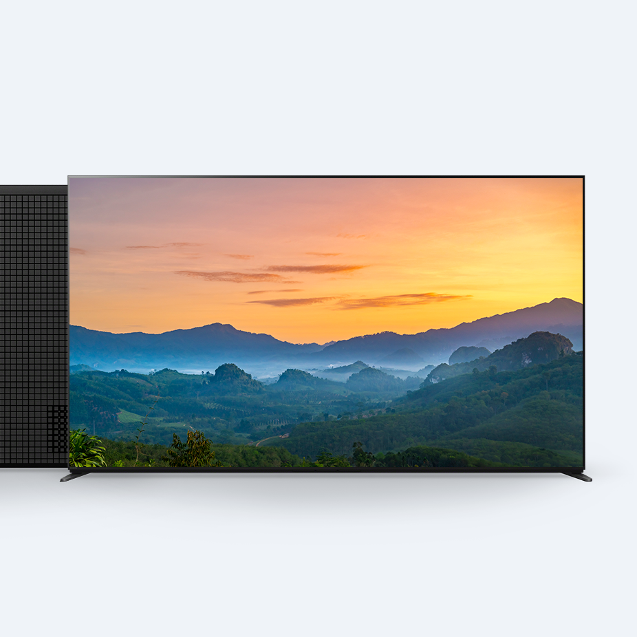 Product image showing front view of a BRAVIA TV displaying a mountain sunset, with rear cover shown extended at left